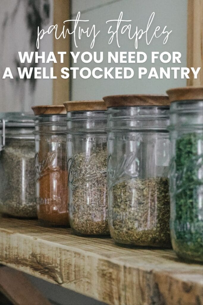 a row of herbs and spices in mason jars with wooden lids