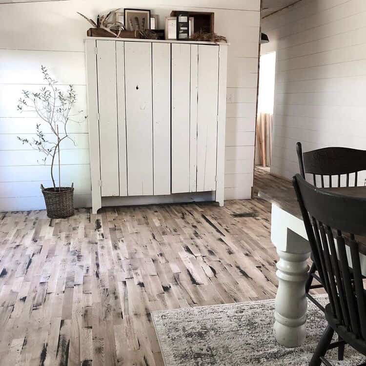 dark painted plywood floors