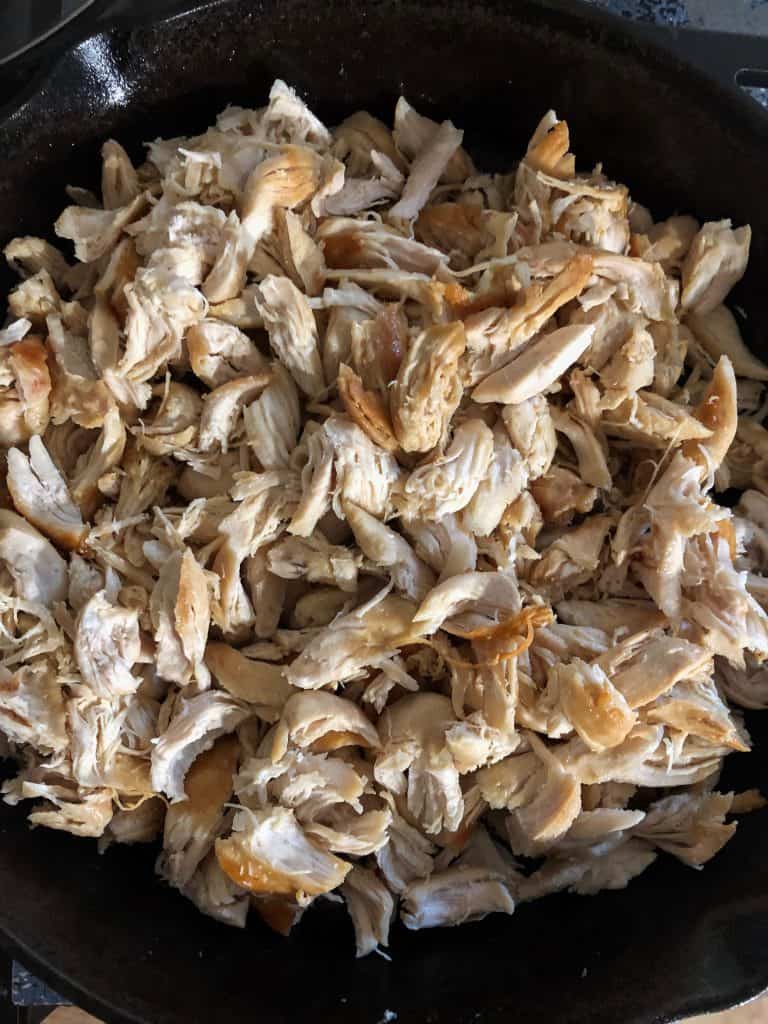 Shredded chicken cooked in butter