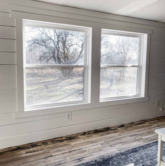 Mobile Home Double Wide Trim Windows and Shiplap Walls Painted in Snowbound by Sherwin Williams