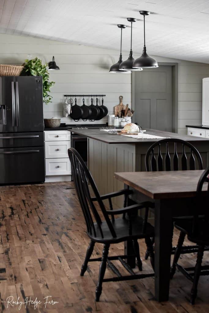 Warm hardwood flooring in a rustic mobile home interior