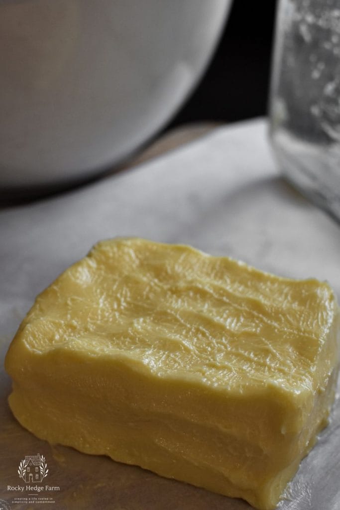 freshly made homemade butter sitting on the counter ready to be wrapped and stored in the refrigerator. 