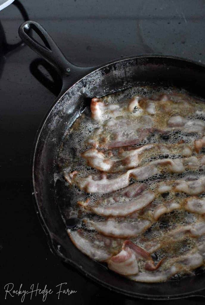 How do you clean cast iron after cooking bacon?