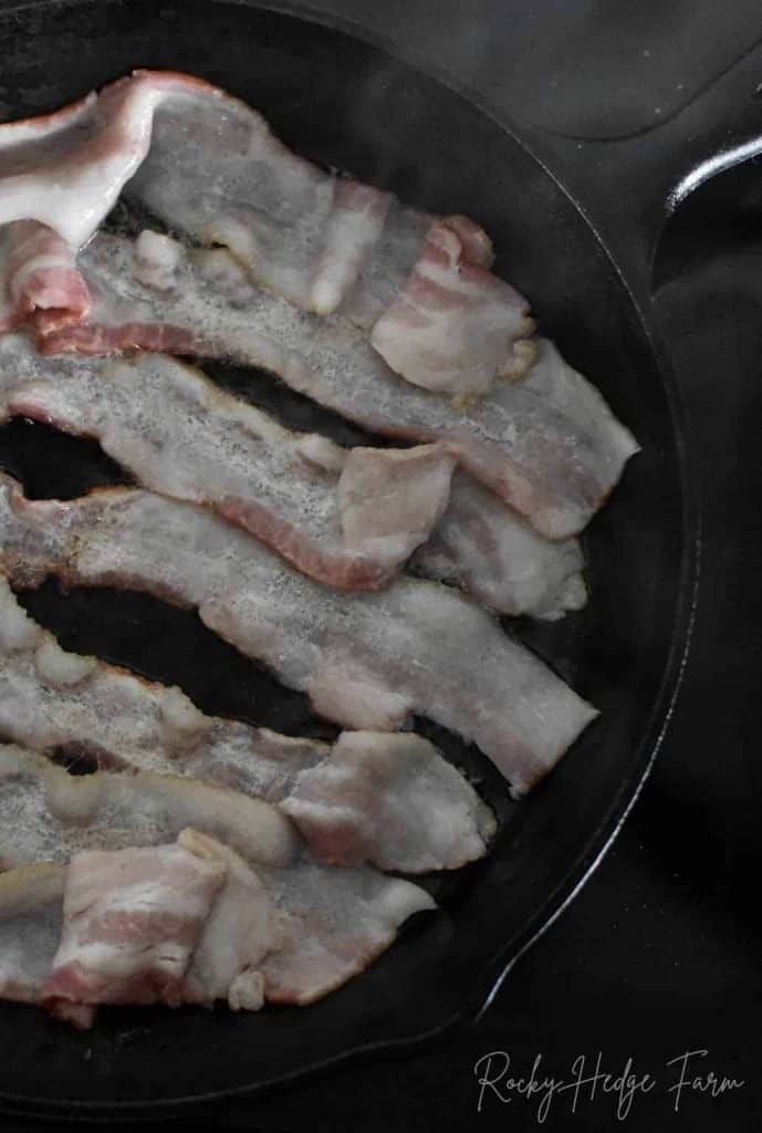 Is it OK to cook bacon in a cast iron skillet?