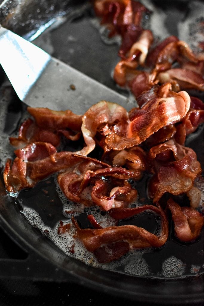 Cooked bacon in a cast iron skillet