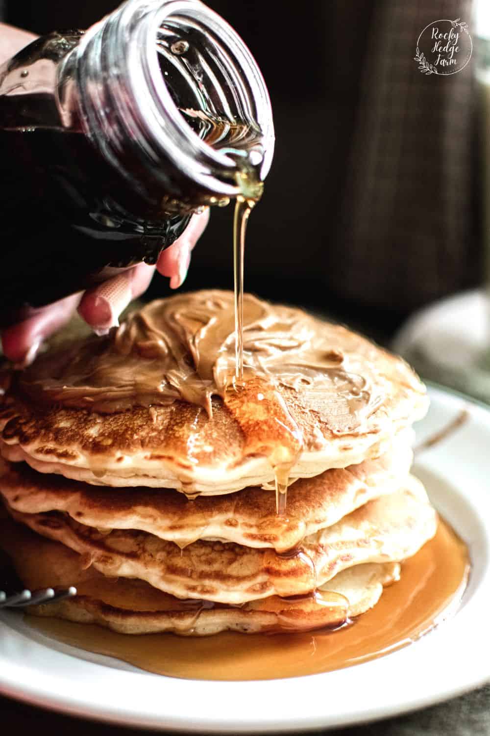 Maple Syrup Drizzled on Pancakes