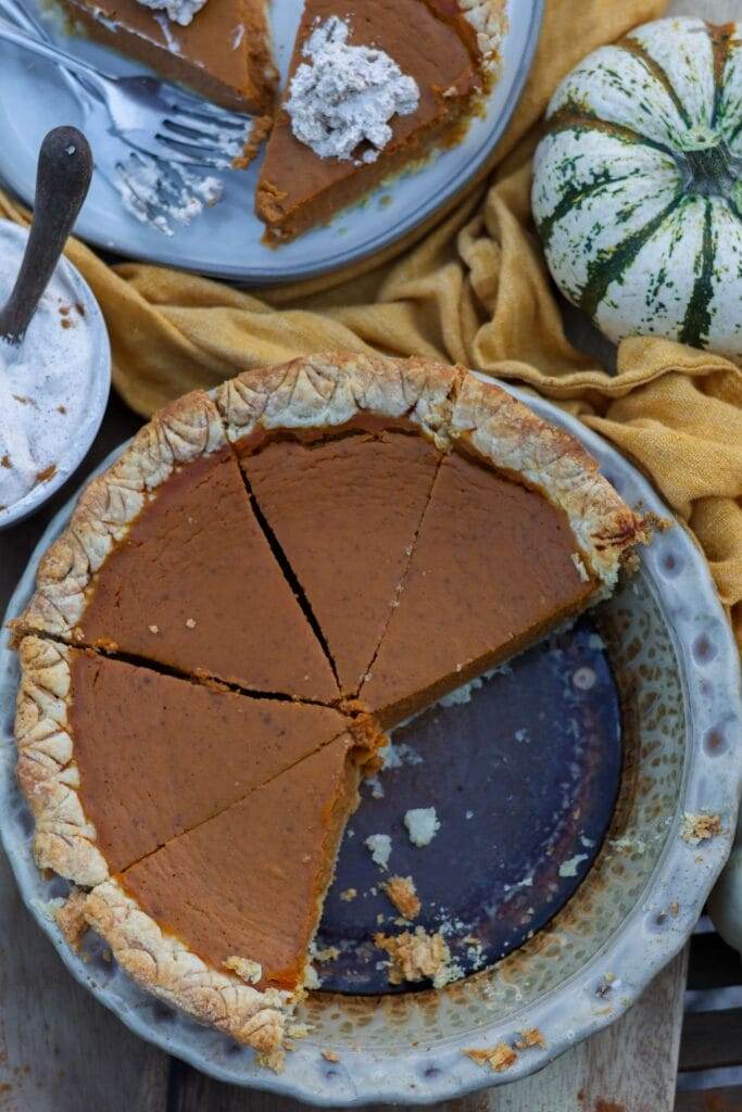 pumpkin pie in a ceramic pie dish