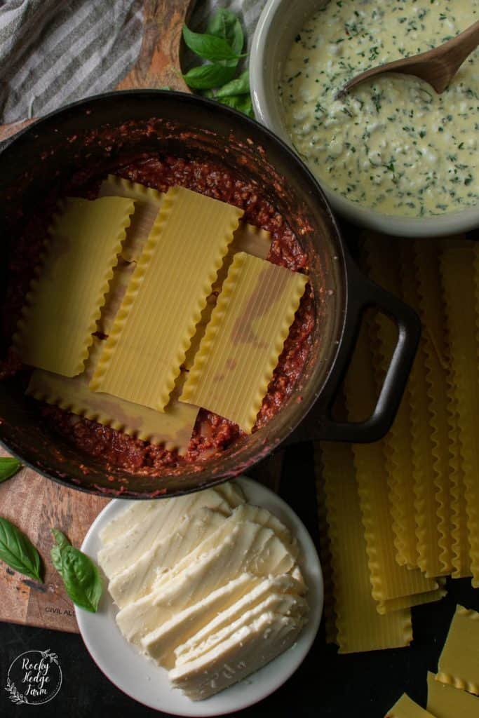 Layering Lasagna Noodles in a Dutch Oven