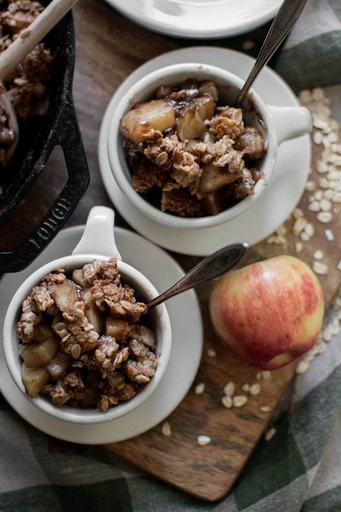 up close image of two bowls with apple crips