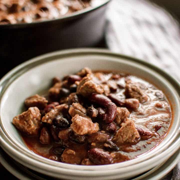 A bowl filled with chili made with stew meat