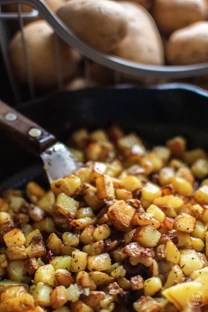 Pan fried potatoes in a cast iron skillet