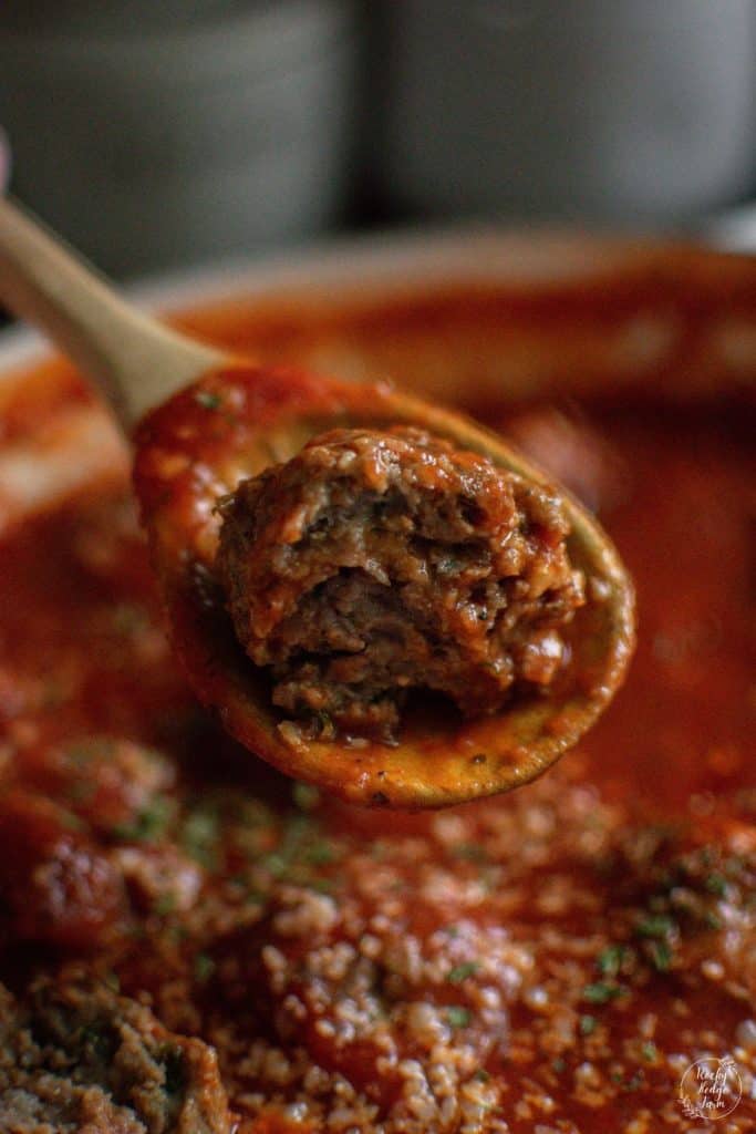 Traditional Italian meatball on a spoon