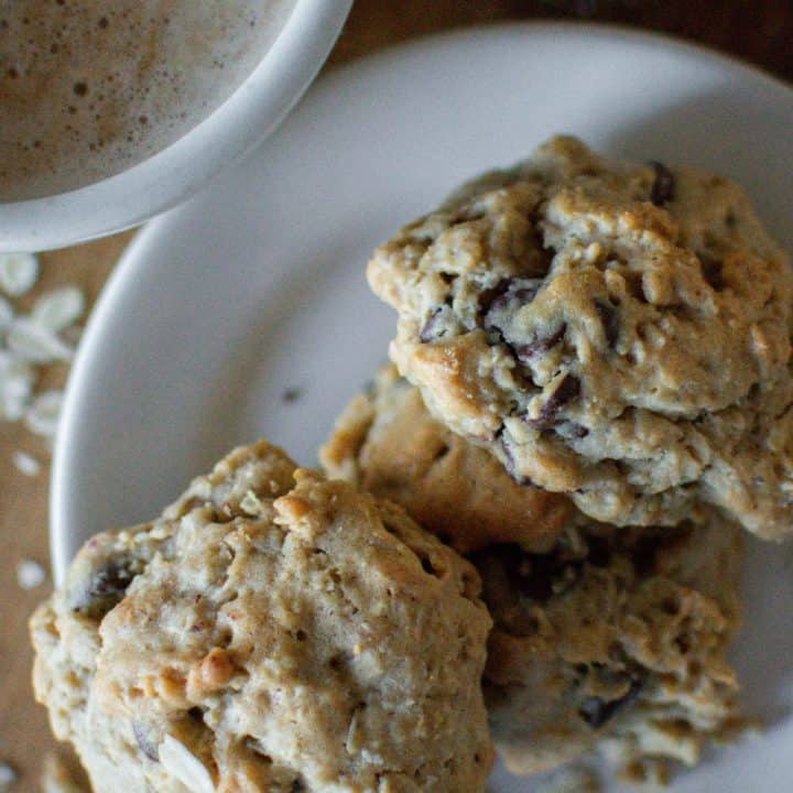 4 oatmeal and honey cookies on a plate.