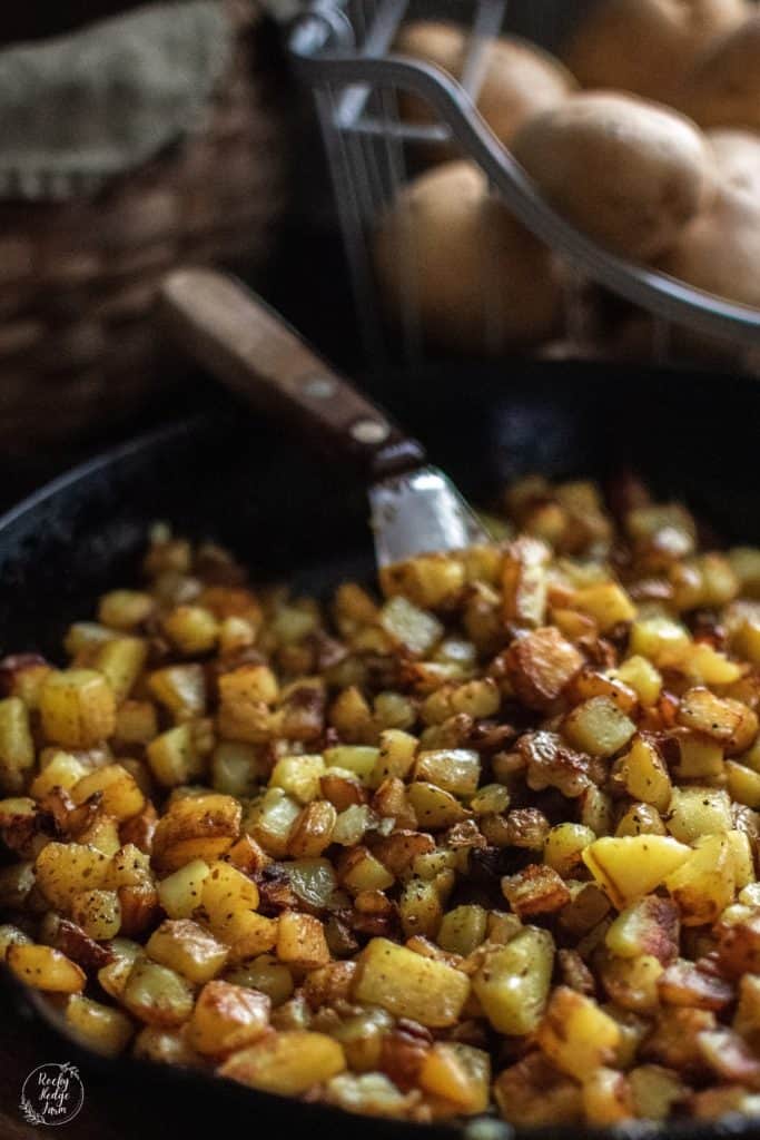 Skillet filled with fried potatoes