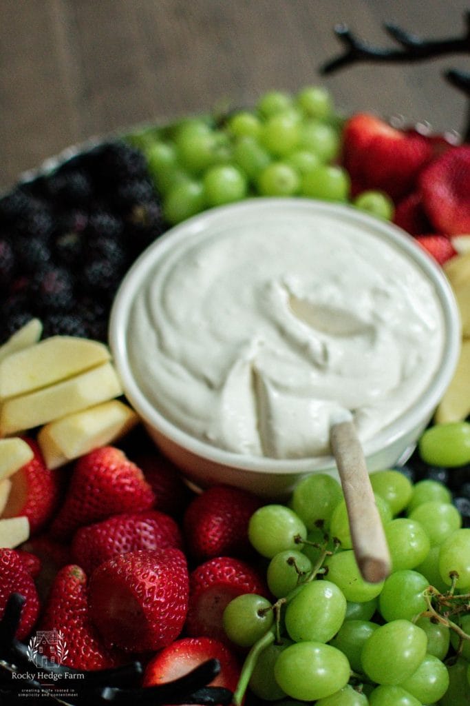 A fruit platter with cream cheese dip