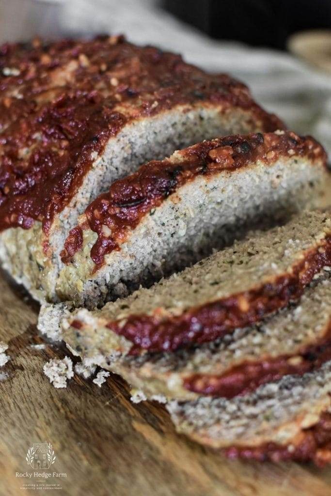 A loaf of meatloaf cut into slices