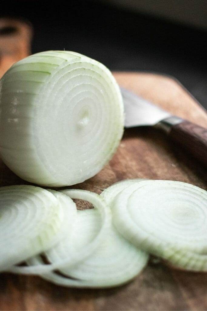 Slicing onions to make caramelized onions