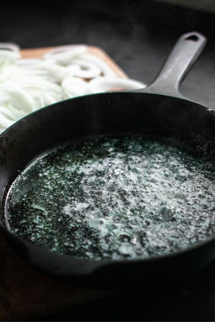 Butter in a cast iron skillet