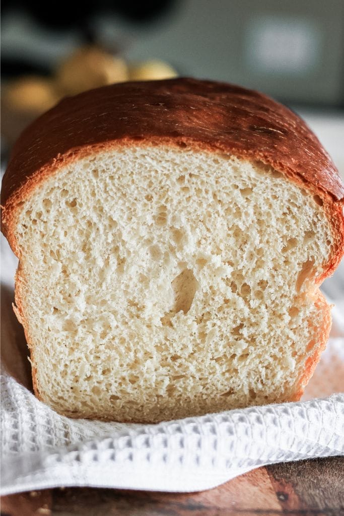 cut loaf of farmhouse white bread