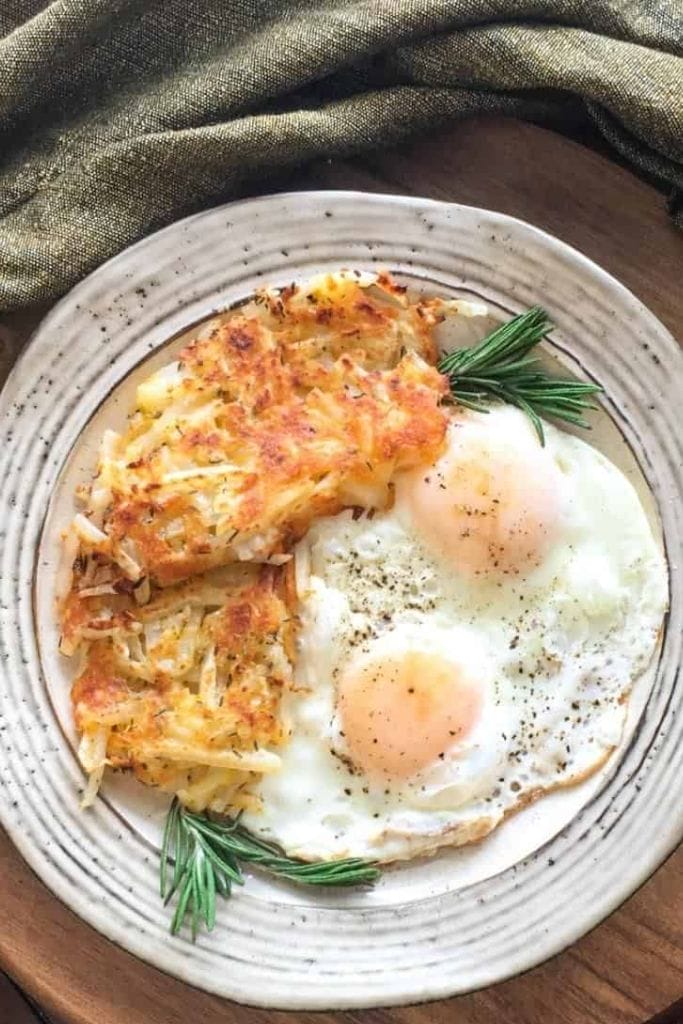 hash browns and eggs on skillet