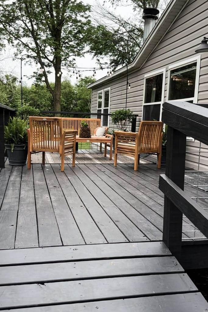 Manufactured home porch after makeover: Stylish and inviting outdoor space.