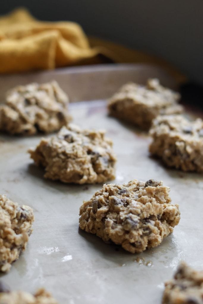 A baking sheet full of ready to bake oatmeal chocolate chip cookies. These cookies bake up fast, no chilling necessary!