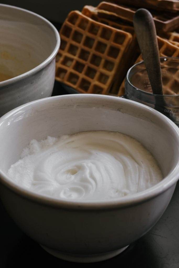 Whipped egg whites ready for folding into batter