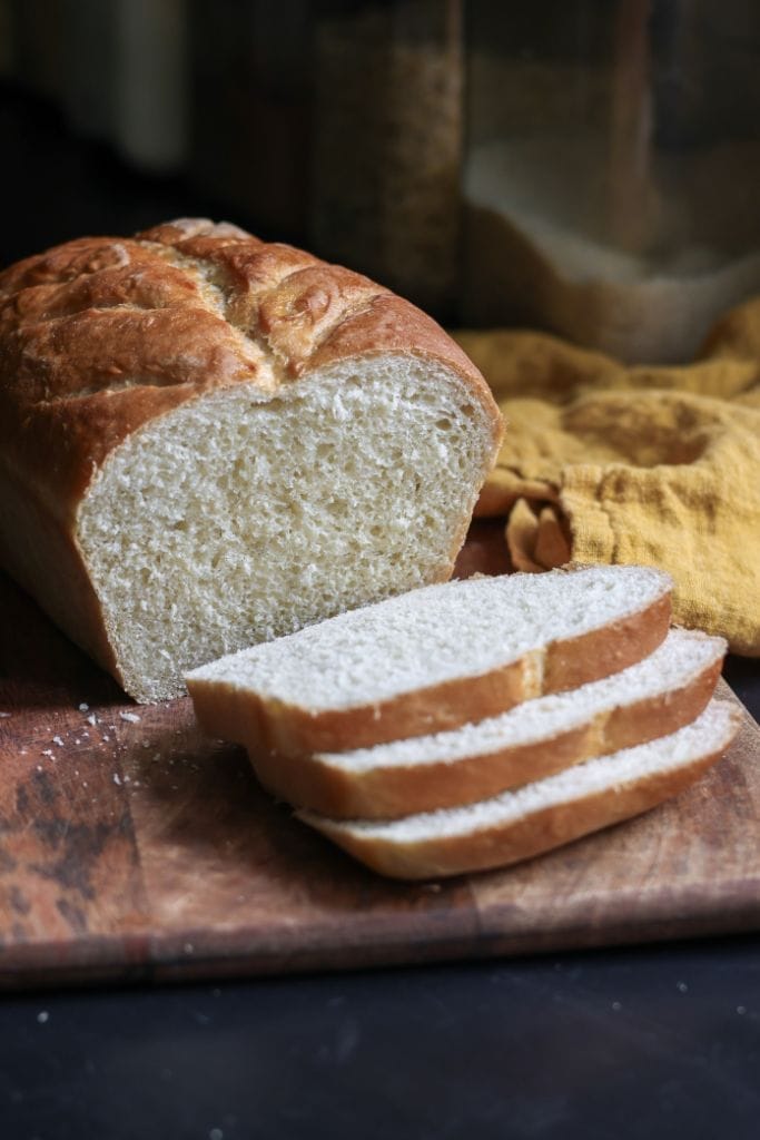 fresh baked loaf of bread that has been sliced