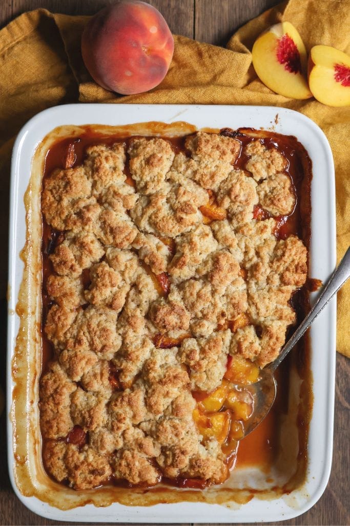 fresh baked peach cobbler with fresh peaches