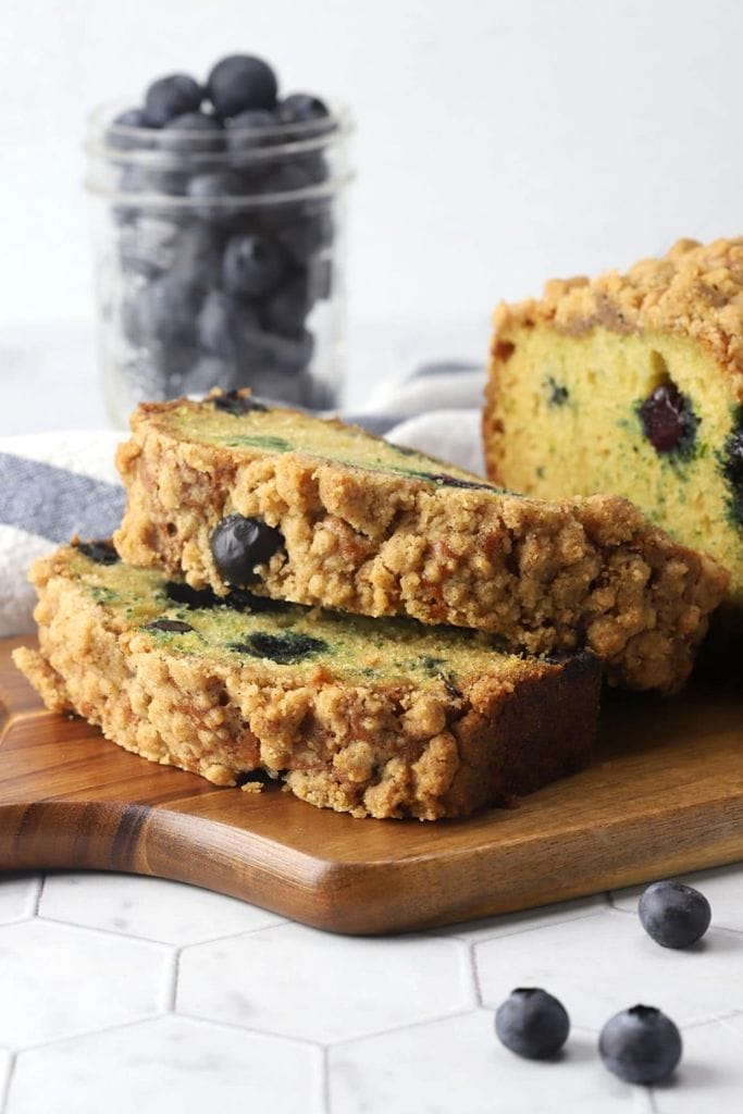 two slices of blueberry streusel zucchini bread