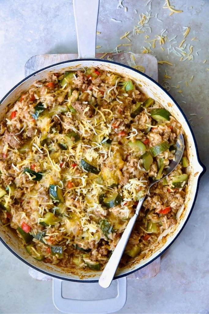 beef rice zucchini meal in a skillet