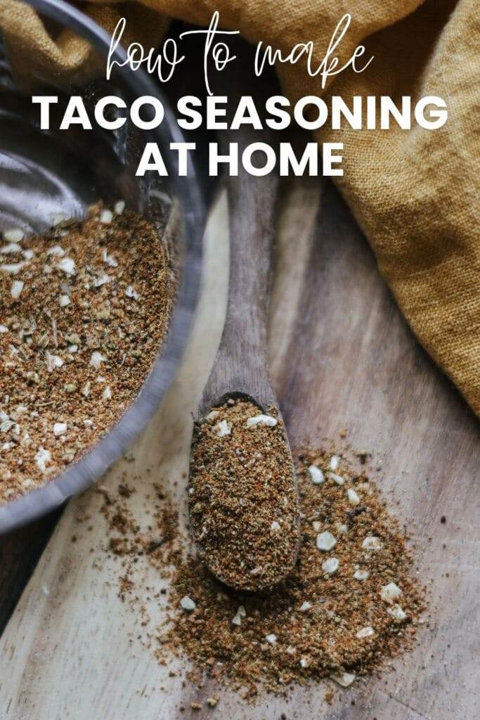 Close-up of chili powder, cumin, and other spices used to make homemade taco seasoning