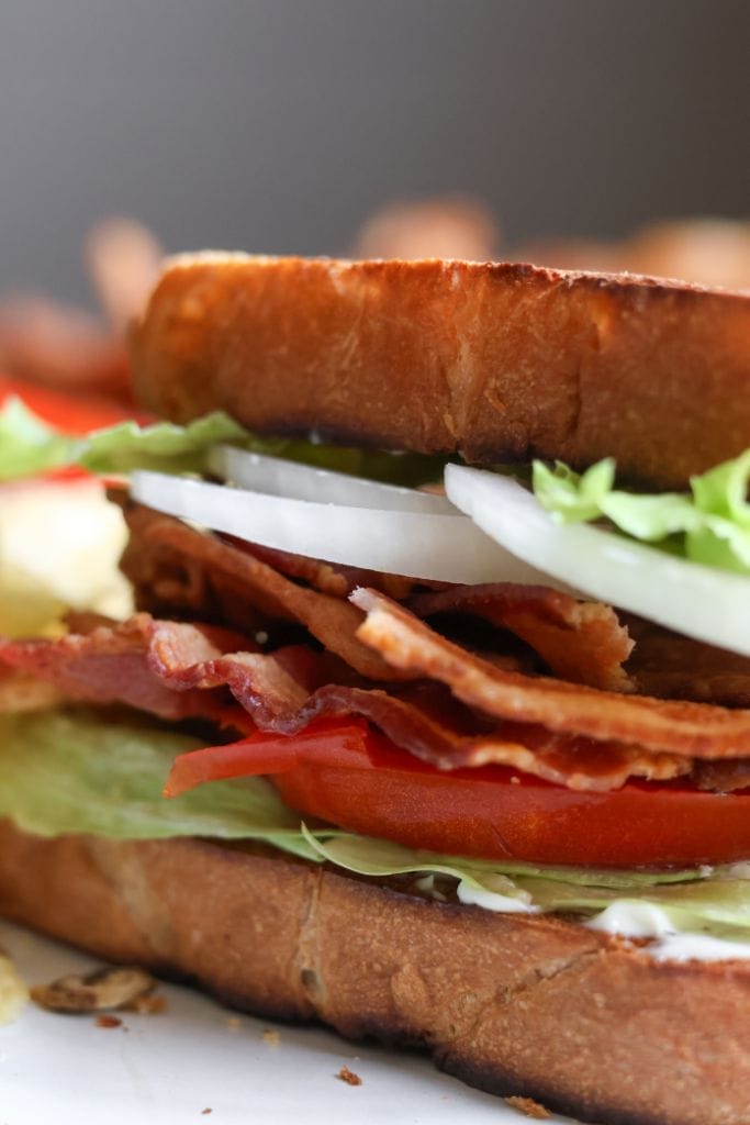 Homemade bacon lettuc and tomato sandwich on a plate 