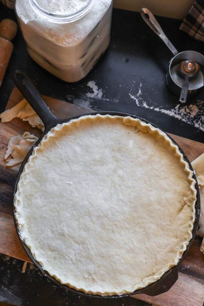 homemade flaky pie crust on top of chicken pot pie filling